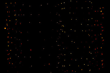 Defocused light dots black background. blurred abstract pattern, bokeh background.