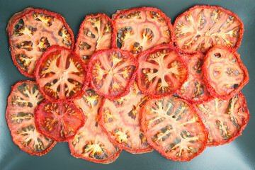 dried tomato slices on a plate. Vitamin vegetable food