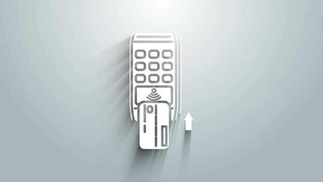 White Pos terminal with inserted credit card icon isolated on grey background. Payment terminal transaction. Pay by card. 4K Video motion graphic animation
