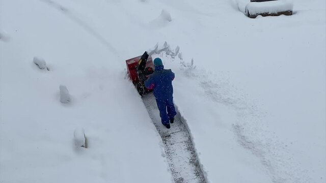 a an with snow plower 