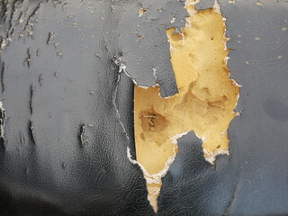 old motorcycle leather seat damage and torn.