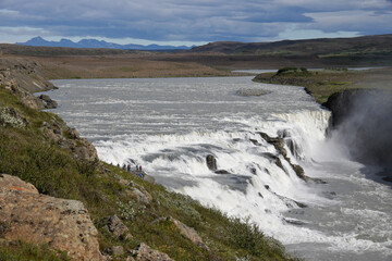 Visitors follow the Trail of Sigridur to an overlook above Gullfoss (Golden Falls) on the Hvita River in Iceland.