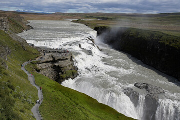 Visitors follow the Trail of Sigridur to an overlook above Gullfoss (Golden Falls) on the Hvita River in Iceland.