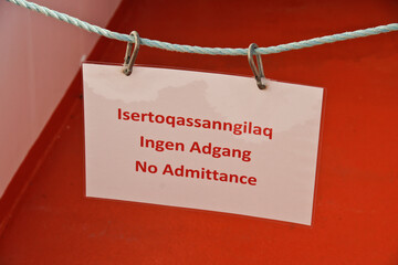 No Admittance sign in Greenlandic, Danish, and English