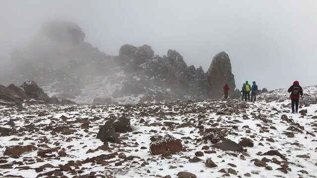 Mountaineers climbing at Mount Savalan (Sabalan) summit in Savalan, Iran. Savalan is the third highest mountain in Iran. It&rsquo;s 4811 meters altitude.