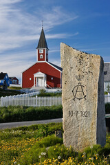 A stone near Frelserens Kirke commemorates the first Danish royal visit to Nuuk, Greenland, by King Christian X and Queen Alexandrine on 10 July 1921.