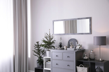Beautiful room interior decorated for Christmas with potted firs