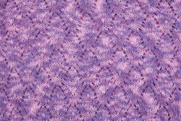 Mixed filigree knitted canvas in light purple colors, handmaid, needlwork, clousup., horizontal photo