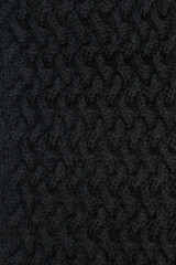 Fototapeta premium Black wool knitted fabric, hand knit, pattern, rib