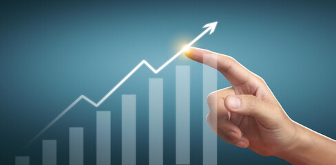 Hand touching  graphs of financial indicator and market analysis chart
