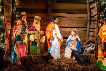 A nativity scene is just one of many Christmas decorations that adorn the lawn of a house near High Park in Toronto, Ontario.