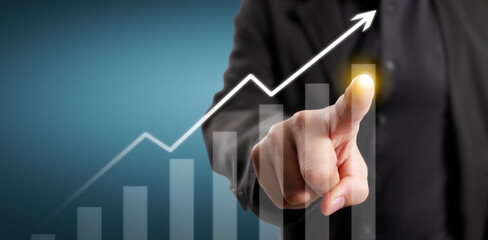 Hand touching  graphs of financial indicator and market analysis chart