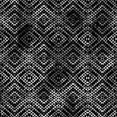 Geometric klim ikat pattern with grunge texture
