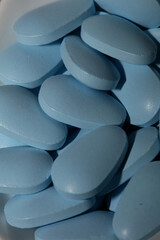 Blue medical pills close up modern background high quality prints
