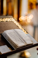 open prayer book on the table in the Russian Orthodox Church.