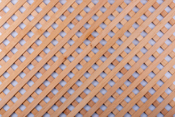Texture of decorative wooden lattice with colored background