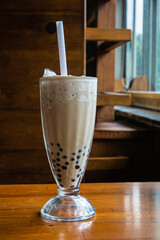 The close up of Taiwan original traditional bubble milk tea beverage, Taiwanese cold drink on...
