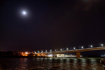 night. road bridge over the river with lights. 