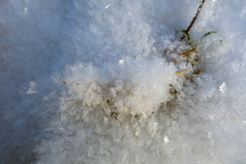 Naklejka na ściany i meble Beautiful snow crystals in the picturesque nature in the winter season