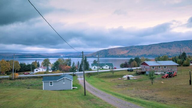 Cape Breton rural village scenery and houses with the background of fall colors, Cabot Trail, Cape Breton, Nova Scotia