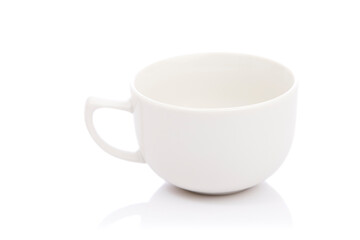 White ceramic cup and saucer on white.