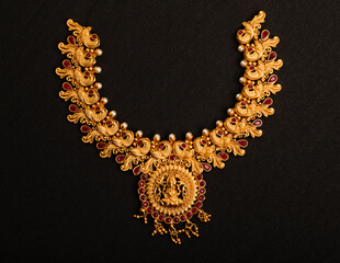 Indian traditional wedding Jewelry on black.