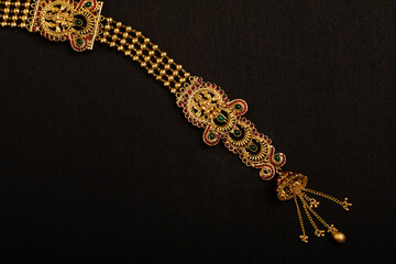 Indian traditional wedding Jewelry on black.