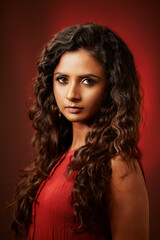Pretty Indian young women fine art portrait at studio shot.