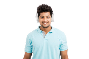 Cheerful young man with headphones isolated on white.