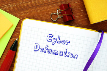 Conceptual photo about Cyber Defamation with written text.