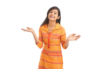 Attractive cheerful young women greetings against white background.