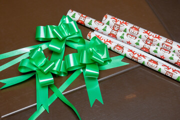 wrapping gift with scissors, tape and paper