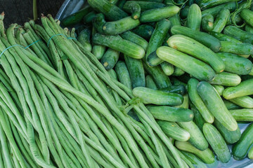 Fresh vegetables, Long beans, cucumber in local markets in Thailand.