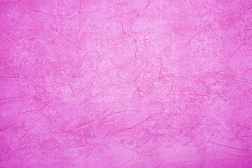Fototapeta premium Pink background texture. Textured wall for design.