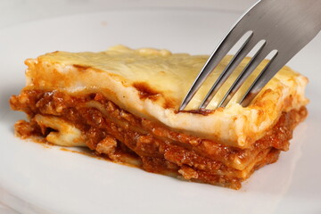 Eating Lasagne Bolognese