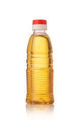Plastic bottle with lamp oil on white.