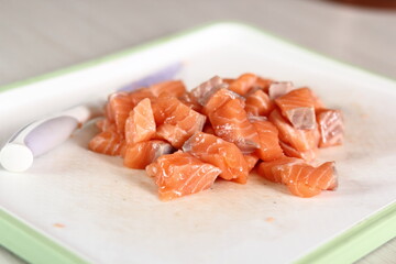Diced salmon fillet. Making Salmon in Puff Pastry Series.