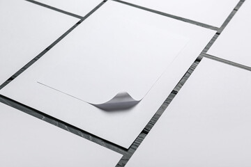 Blank paper sheets on wooden background, closeup