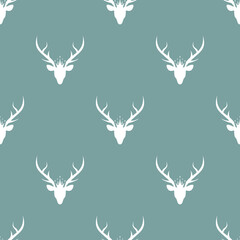seamless pattern with white silhouette of deer head with royal crown.