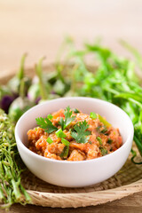 Northern Thai food (Nam Prik Ong), Spicy chili minced pork with tomatoes, Thai chili paste eating with vegetables
