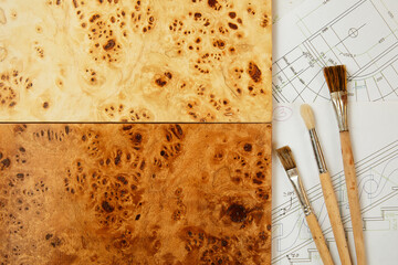 Wood carving. Woodworking. Wood samples of different colors with coating and brush