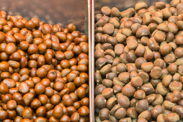 Lots of fresh chestnut fruit and Chestnuts roasted and ready to eat