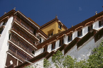 Fototapeta na wymiar Close up of Potala Palace with white wall and steps in Lhasa, Tibet, China.