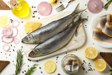 Concept of tasty lunch with fresh herring fish on white background