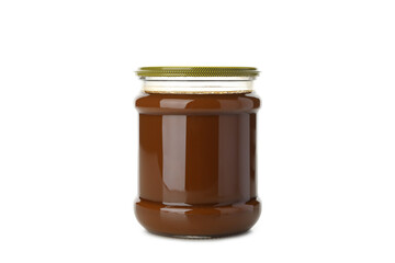 Glass jar with caramel condensed milk isolated on white background