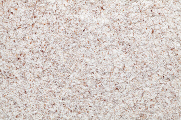 Food background of black whole wheat flour. Top view.