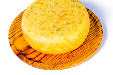 Spanish omelette on a wooden tray on white background