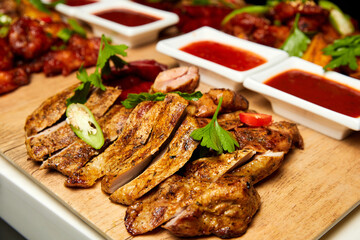 Chopped Pieces of Baked pork with tomato sauce