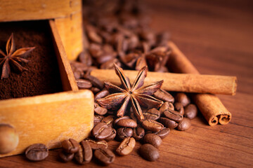 Vintage classic antique italy german hand manual ground coffee grinder powder of organic roasted espresso bean cinnamon star anise aroma in retro old wooden rustic homemade cafe shop barista style