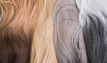 Wigs, natural and synthetic hair. Women's beauty concept. Close up photo of wig, hair for ladies